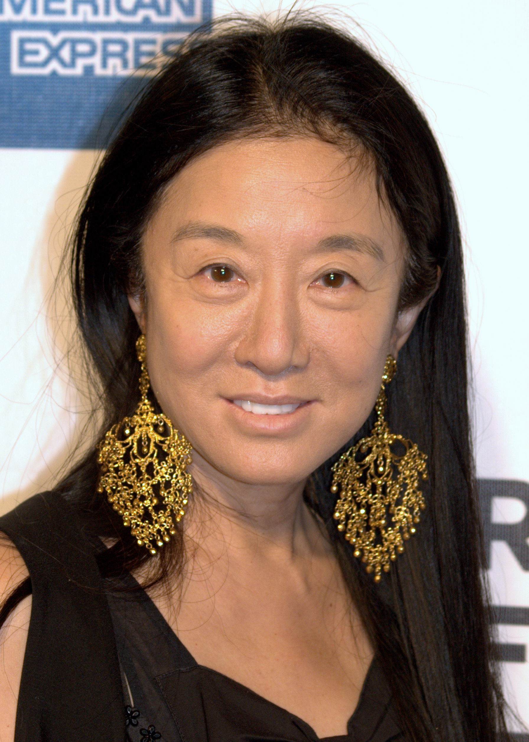 Imagem de referência relacionada a Vera Wang, item descrito como designer de moda