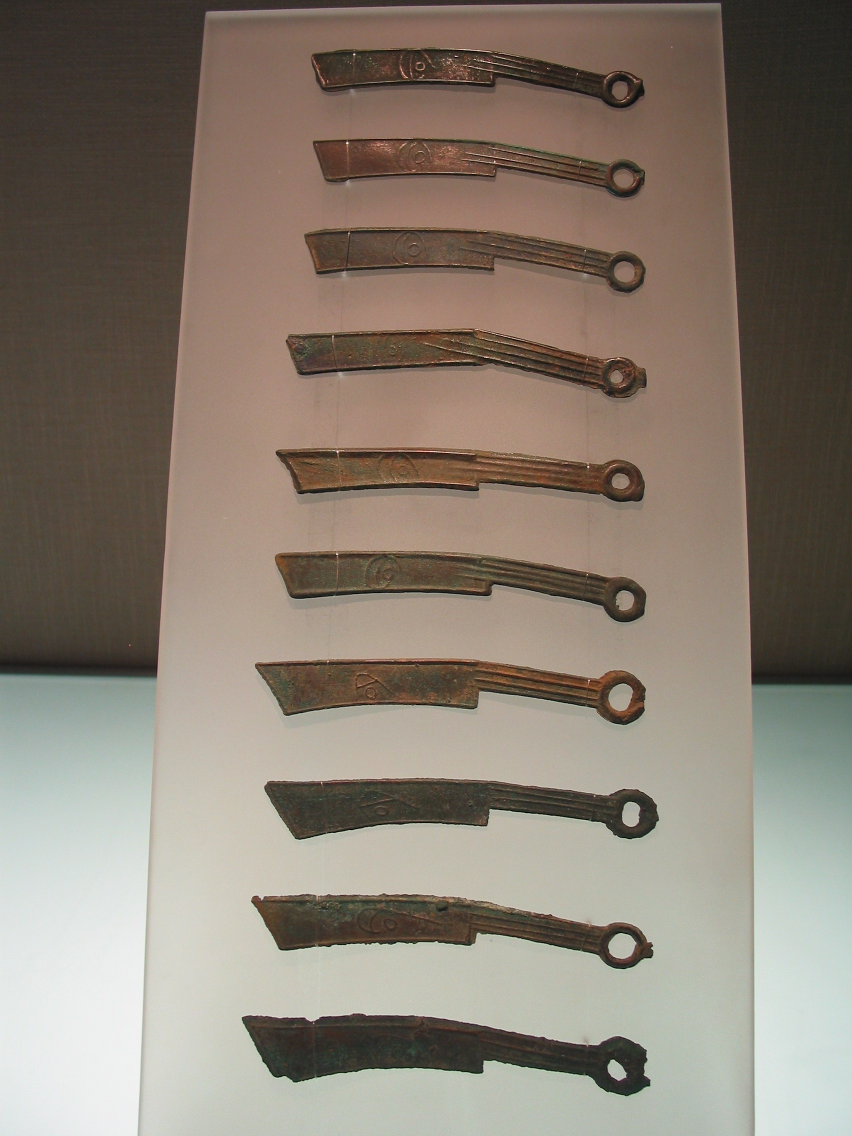 Imagem de referência relacionada a Moeda em forma de faca, item descrito como dinheiro histórico da China