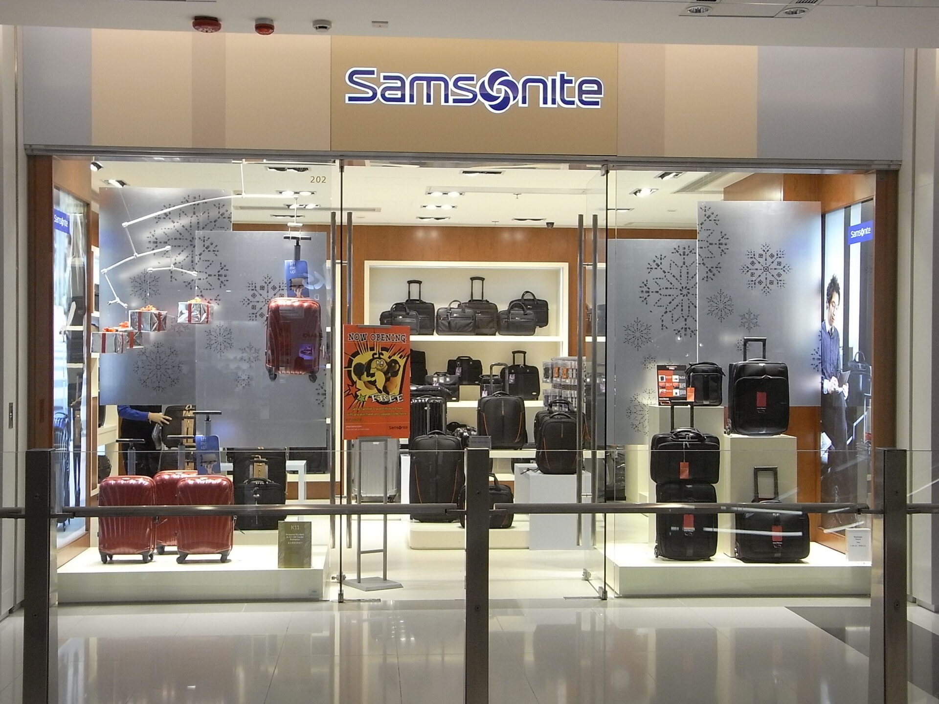 Imagem de referência relacionada a Samsonite, item descrito como empresa multinacional de bagagem e artigos de viagem