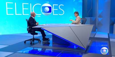 Renata Lo Prete e Lula no cenário do 'Entrevista com o Candidato' montado nos Estúdios Globo, zona oeste do Rio Foto: Reprodução/TV